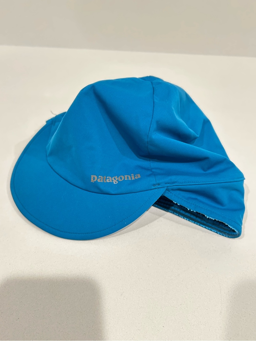 Patagonia Wind Shield Beanie Hat Underwater Blue Brim Ear Flaps 33325 FA15